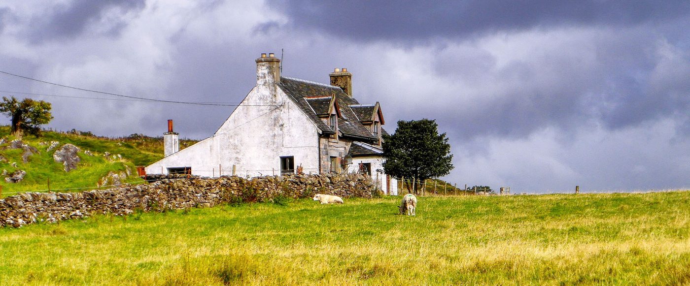 Cottage in field, Scotland