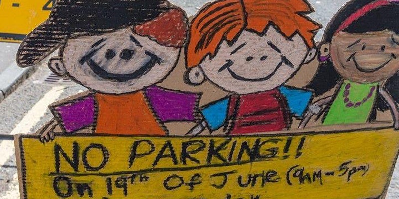 poster saying no parking