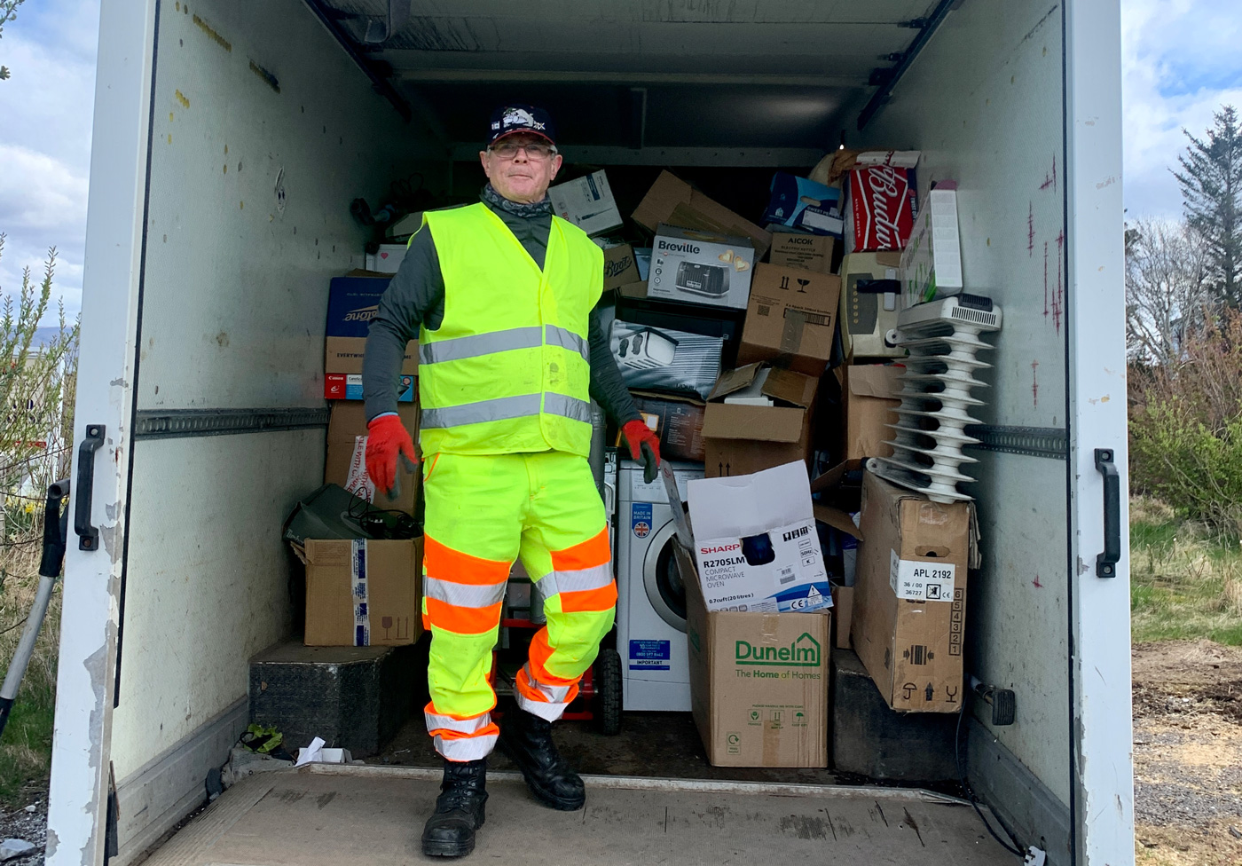 Electrical waste stacked in a truck for recycling